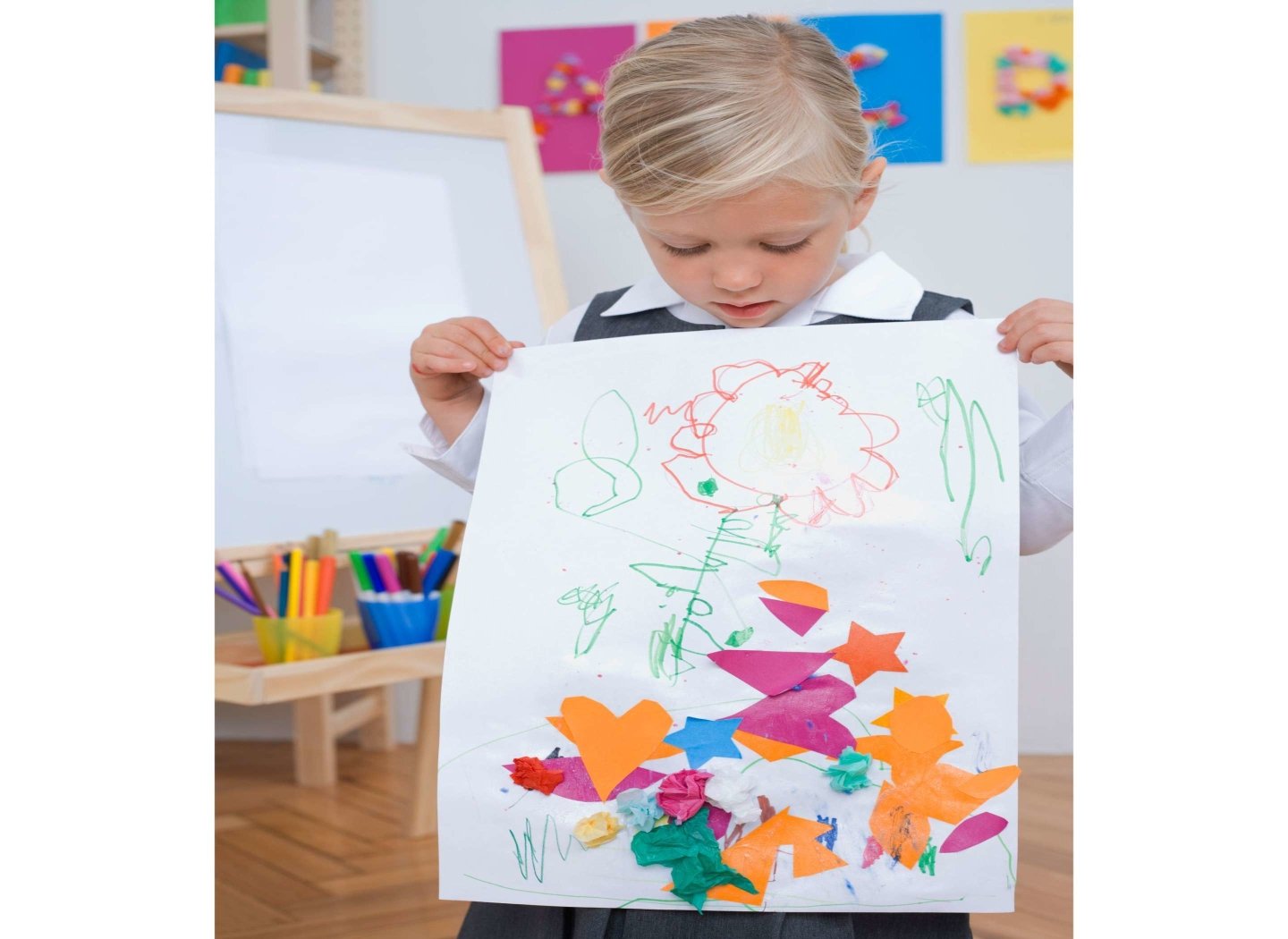 kid-girl-holding-a-cool-drawing