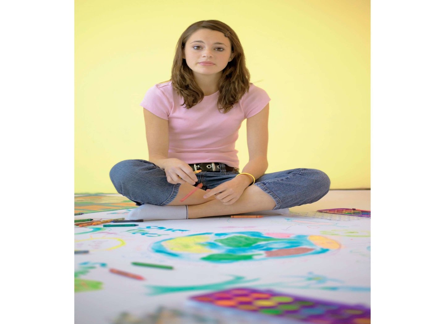 teenager-sat-on-floor-painting