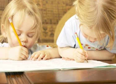 girl-kid-drawing-with-pencil