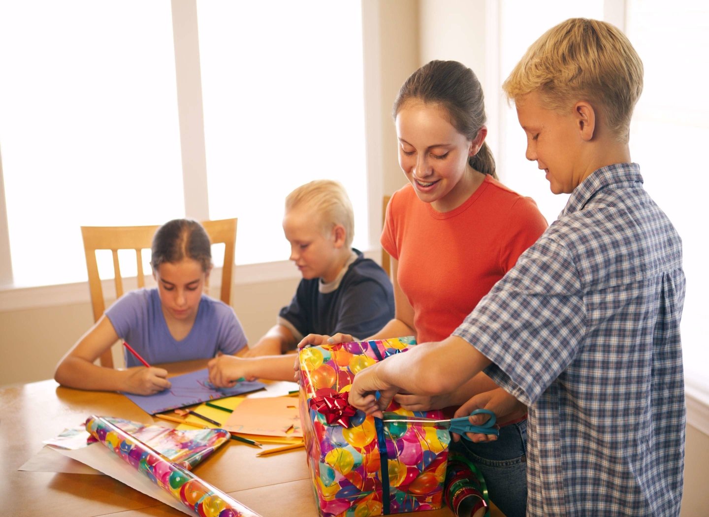 family-kids-crafts-on-dining-table