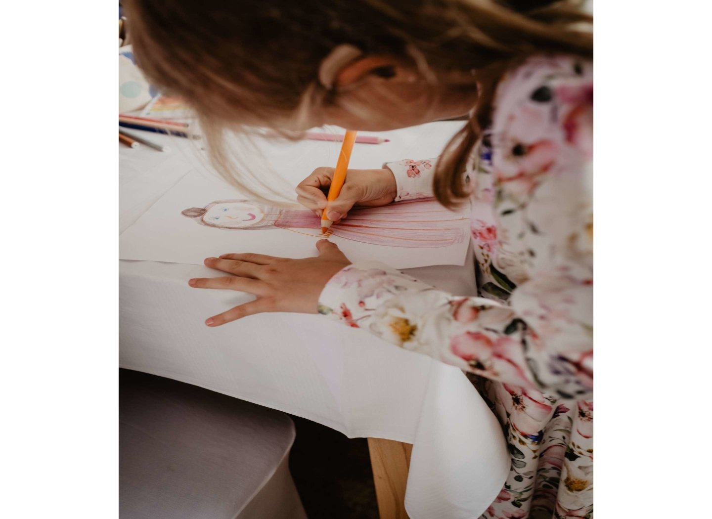 young-girl-drawing-on-table