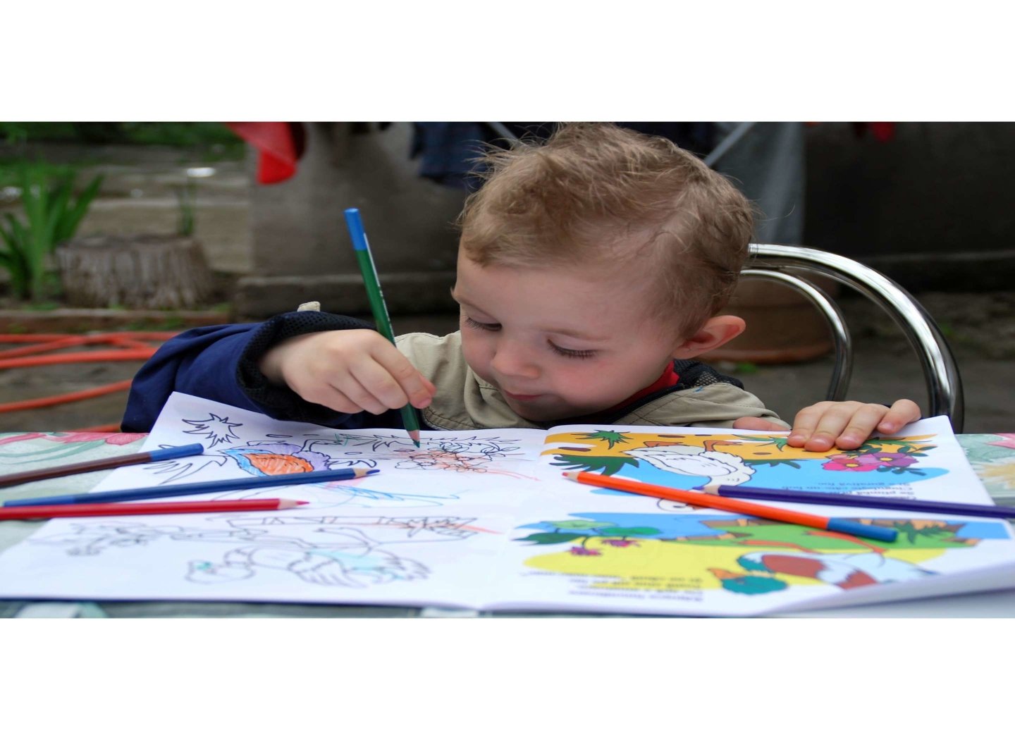 boy-colouring-with-colour-pencils
