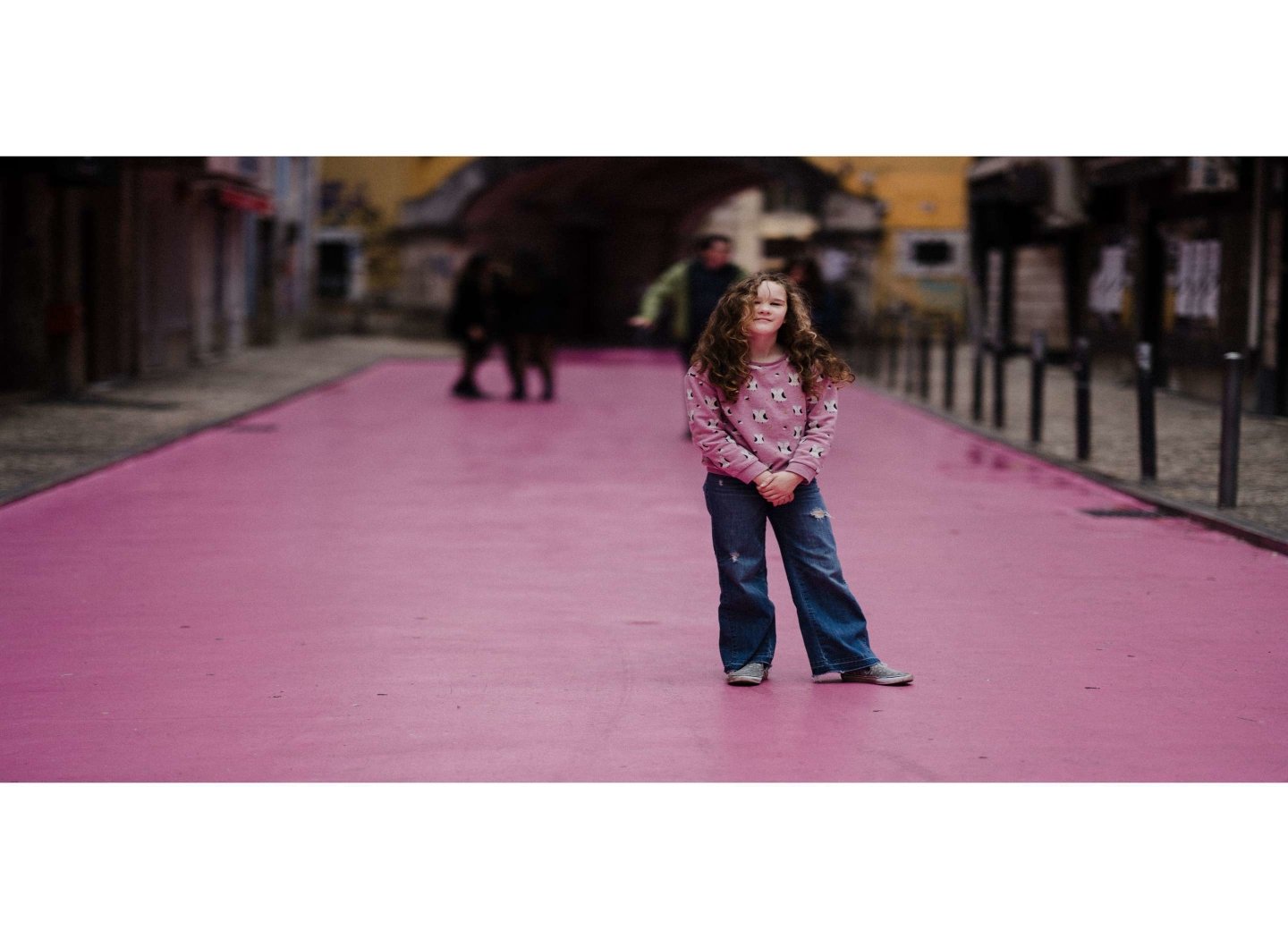kid-standing-on-pink-floor