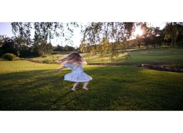 girl-kid-dancing-in-nature