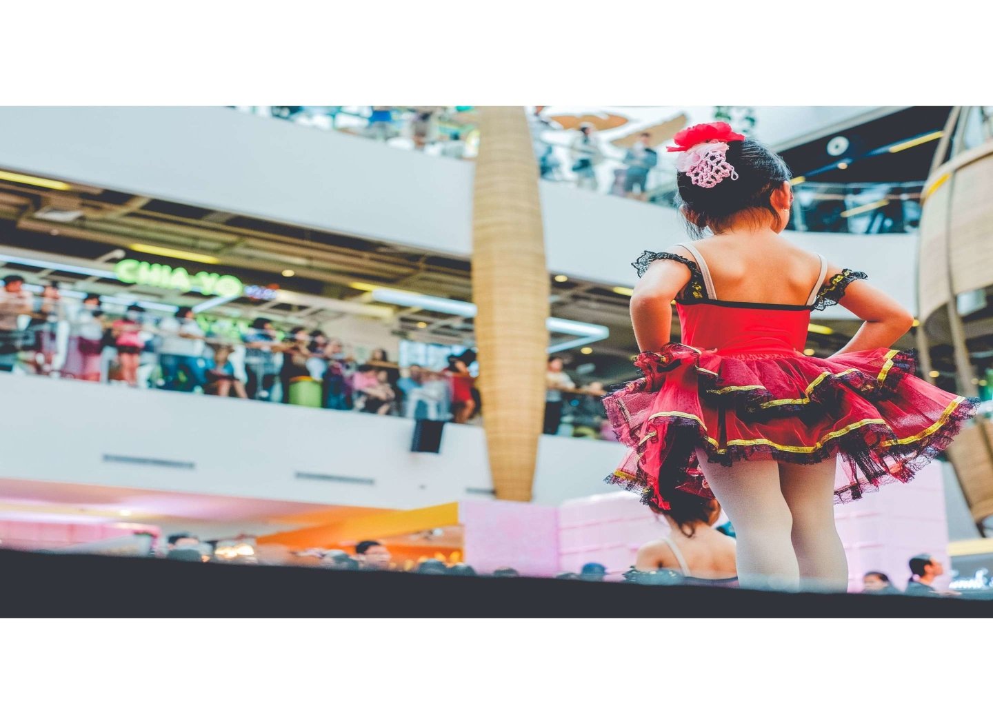 girl-in-red-dress-dance-before-audience