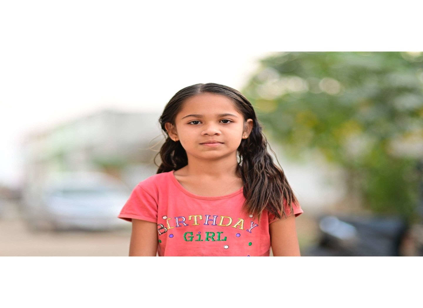 young-kid-girl-looking-camera