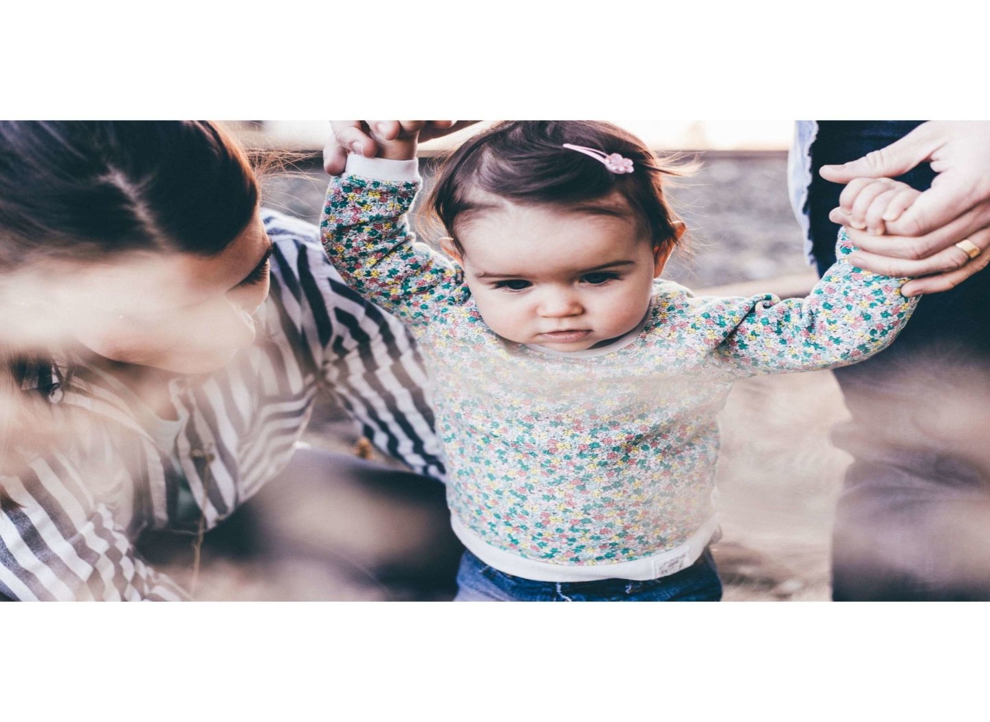 child-toddler-in-shot-with-parents